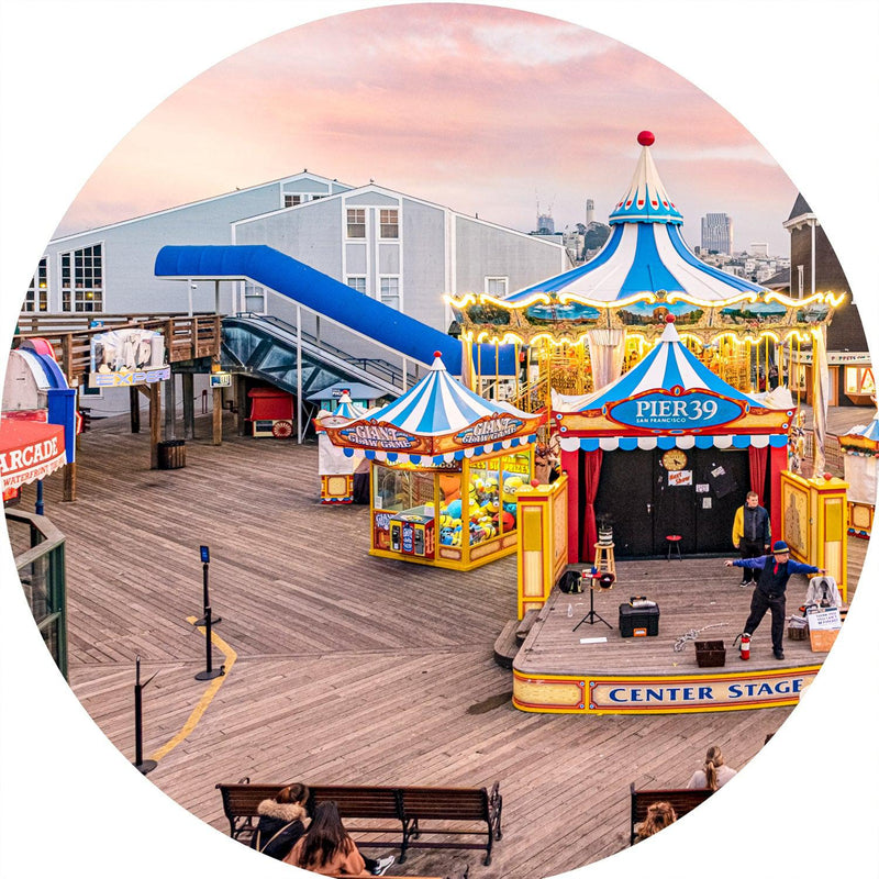Circus on Pier 39 (Round) Jigsaw Puzzle by Artist Jaime Dormer and Manufactured by QPuzzles in Queensland