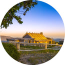 Craig's Hut Sunrise (Round) Jigsaw Puzzle by Artist Jaime Dormer and Manufactured by QPuzzles in Queensland