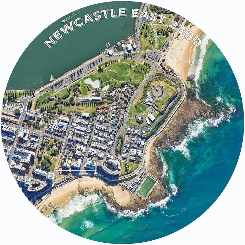 Newcastle East 2600 (Round) Jigsaw Puzzle by Artist Craig Holloway and Manufactured by QPuzzles in Queensland