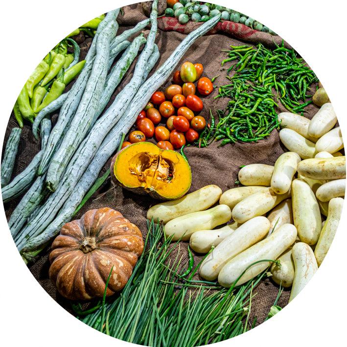 Veggie Market (Round) Jigsaw Puzzle by Artist Jaime Dormer and Manufactured by QPuzzles in Queensland