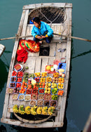 Vietnamese Fruit Vendor (Portrait) Jigsaw Puzzle by Artist Simon Stokes and Manufactured by QPuzzles in Queensland